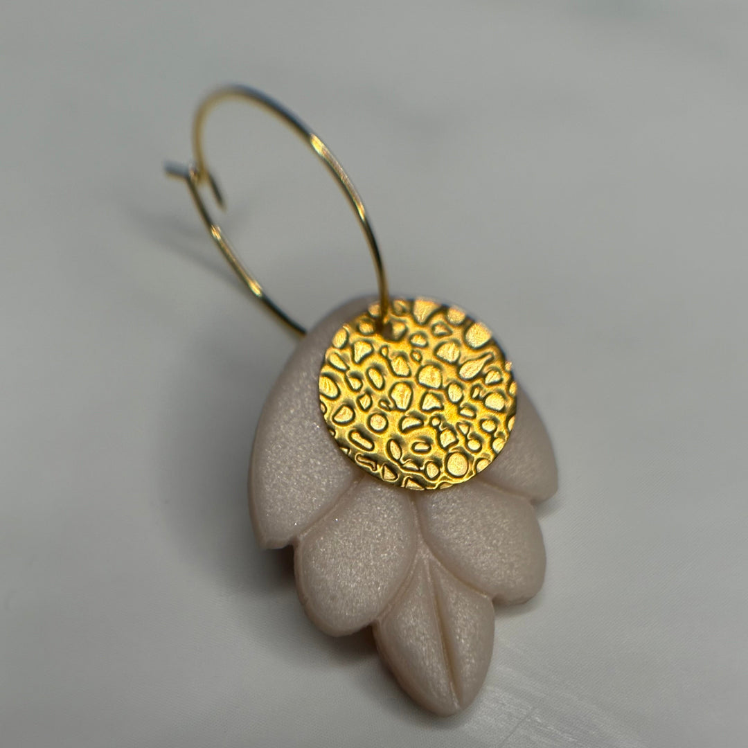 Golden petal charm