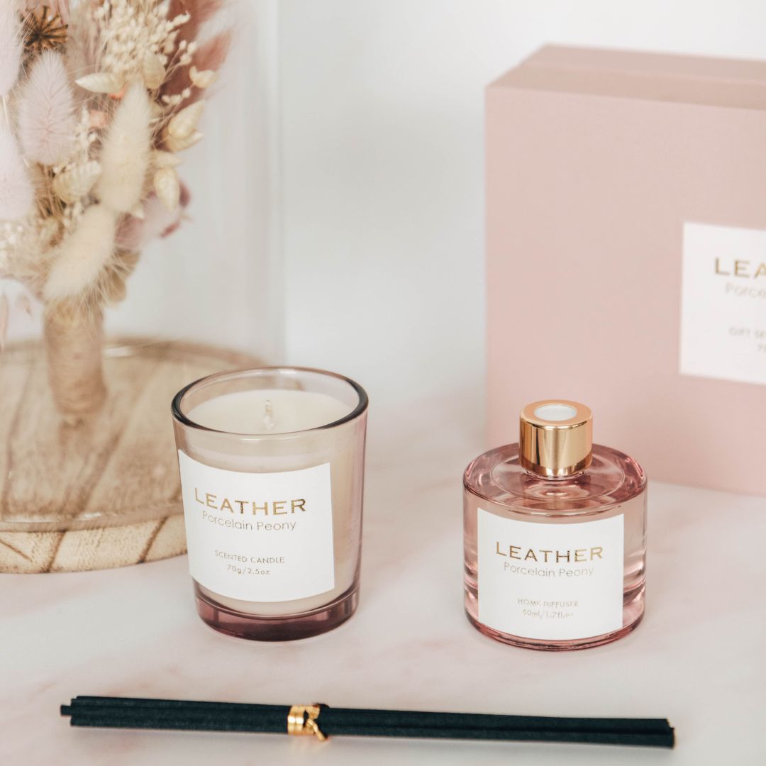 Pink Leather Porcelain Peony gift pack featuring a diffuser and candle with elegant design.